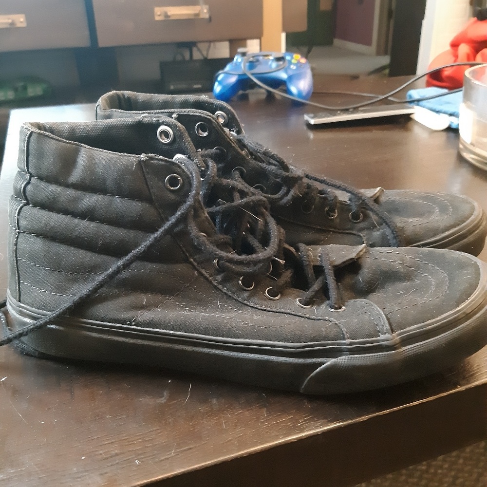 All black high top vans
